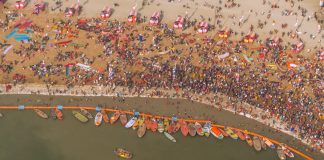Kumbh Mela India – World’s Largest Gathering Multitude at Kumbh for a holy dip - shot from helicopter - Kumbh Mela India - World's Largest Gathering - Travelure ©