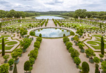 Chateau de Versailles Near Paris France The Orangerie in the gardens of Château de Versailles - Travelure ©