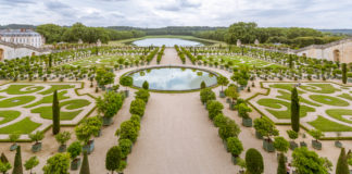 Chateau de Versailles Near Paris France The Orangerie in the gardens of Château de Versailles - Travelure ©
