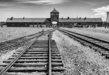Auschwitz – Homage to the WW-II Holocaust Victims Hell's Gate or Gate of Death, Birkenau - Travelure ©
