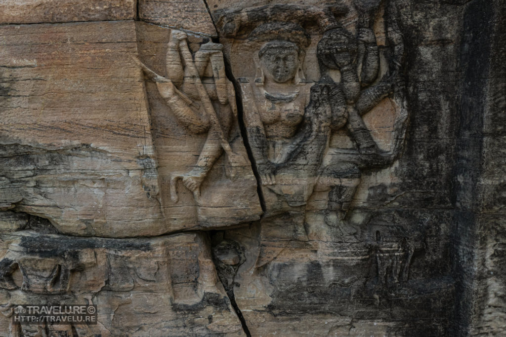 One of the many sculpted panels in Udayagiri Caves - Travelure ©