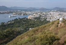 Udaipur City Palace Calling it City Palace is misleading as it houses 11 different palaces. Those splendid palaces, though built by different rulers, bear a remarkable similarity. Many towers, domes, and arches embellish this complex. - Udaipur City Palace - Travelure ©