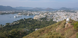 Udaipur City Palace Calling it City Palace is misleading as it houses 11 different palaces. Those splendid palaces, though built by different rulers, bear a remarkable similarity. Many towers, domes, and arches embellish this complex. - Udaipur City Palace - Travelure ©