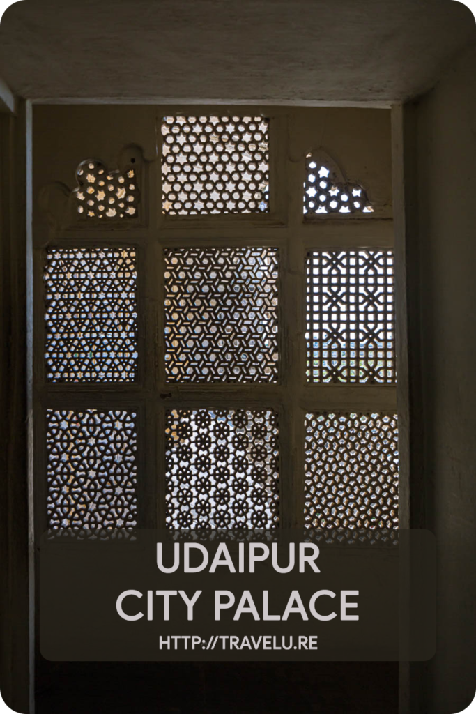 Calling it City Palace is misleading as it houses 11 different palaces. Those splendid palaces, though built by different rulers, bear a remarkable similarity. Many towers, domes, and arches embellish this complex. - Udaipur City Palace - Travelure ©