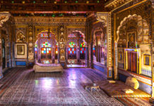 Mehrangarh Fort, Jodhpur, Rajasthan Mehrangarh also seems like an island that rose 400 feet from the plain below. The city beneath, like the waters in the sea, are all painted blue to honour a royal decree, giving Jodhpur the epithet of the blue city. - Mehrangarh Fort, Jodhpur, Rajasthan - Travelure ©