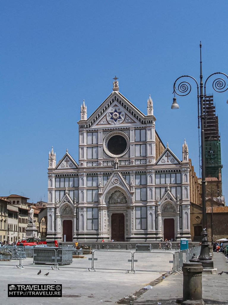 The Neo-Gothic facade of the Basilica of Santa Croce - Travelure ©
