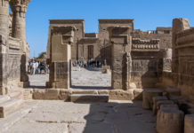 Temple of Isis at Philae, Egypt Isis is associated with funeral rites, but also as the giver of life, a healer, and a protector of kings. Little wonder they represent her with a throne on her head. - Temple of Isis at Philae, Egypt - Travelure ©