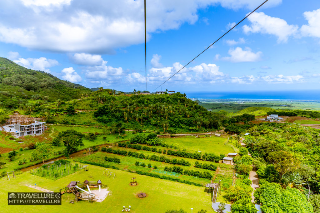 Beyond La Vallee Des Couleurs Nature Park lies the Indian Ocean - A view from the 3rd longest zip-line in the world! - Travelure ©
