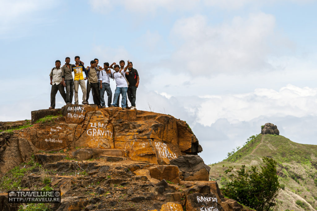 A group of youngmen having their own style of fun at Sinhagad Fort - Travelure ©
