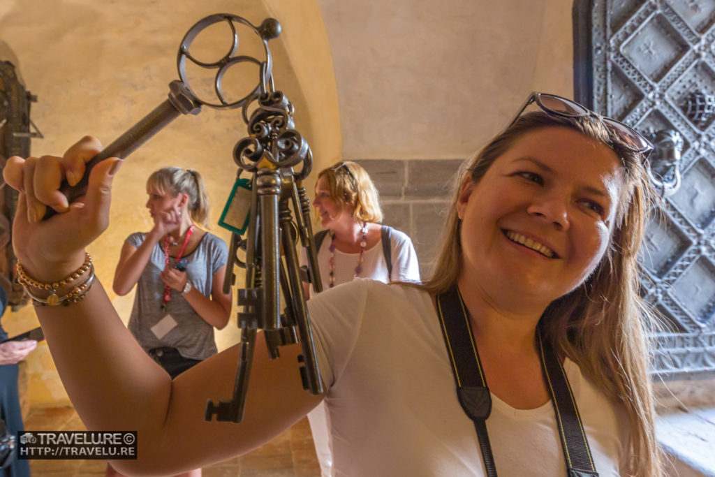 For a large castle, the key better be large. My friend Elena shows off the Krivoklat Castle key. - Travelure ©