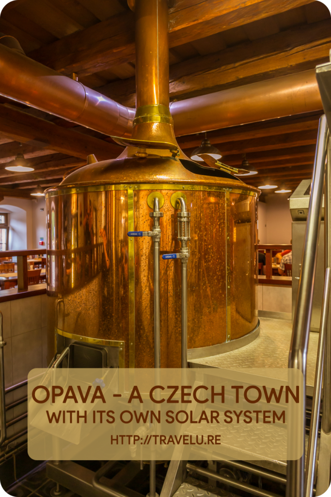 Just in front of the town hall, a round stone ball lies in the centre of a fountain. This 230-cm ball represents the sun. - Opava - A Czech Town with its own Solar System - Travelure ©