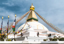 Boudhanath Kathmandu – The Largest Stupa in Nepal The all-seeing eyes painted on the four sides on the base of the spire symbolise awareness, and their gaze follows you as you go around its perimeter soaking in the bustle and belief. - Boudhanath Kathmandu - The Largest Stupa in Nepal - Travelure ©