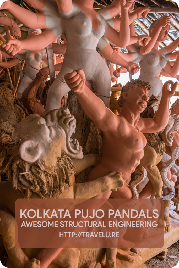 Over the years, Kolkata localities have modelled their pandals after Eiffel Tower, Chateau Versailles, White House, Burj Khalifa, Sydney Opera House, Lotus Temple, and more. - Kolkata Pujo Pandals - Awesome Structural Engineering - Travelure ©
